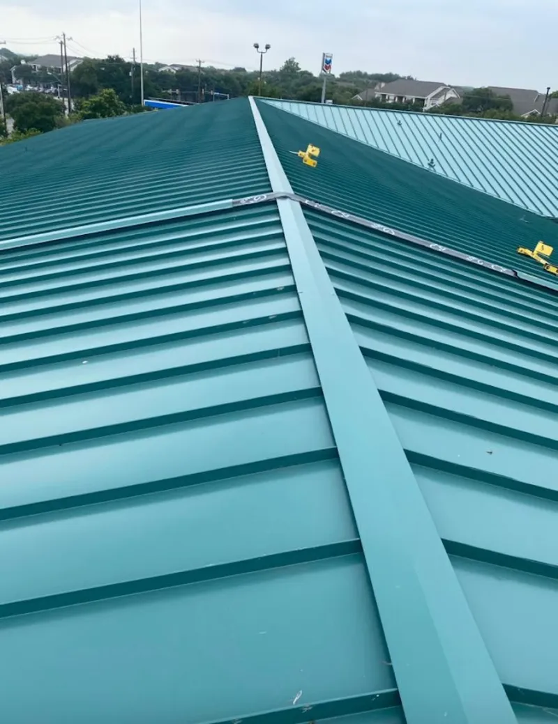 Green commercial metal roof ridge and valley for Metal Roof Repair in Fairview Shores