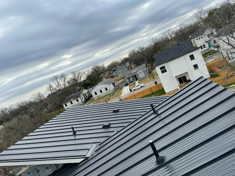 Standing seam metal roof panels with vents for Skylight Repair in Fairview Shores